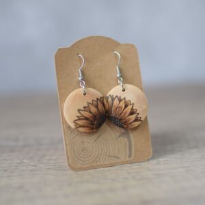 photo showing wooden drop earrings with sunflower design