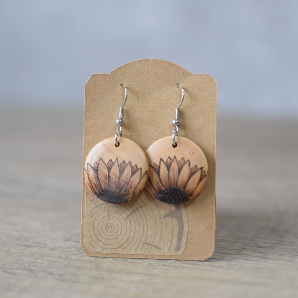 photo of pyrography earrings on kraft card backing