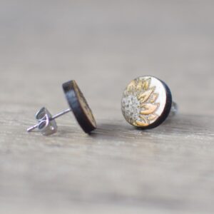 Photo of wooden laser engraved stud earrings with sunflower design