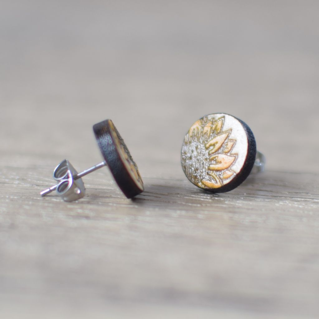 Photo of wooden laser engraved stud earrings with sunflower design