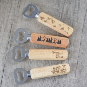 Four designs of wooden laser engraved bottle opener. Featuring Deer, mountain scene, dogs and bees