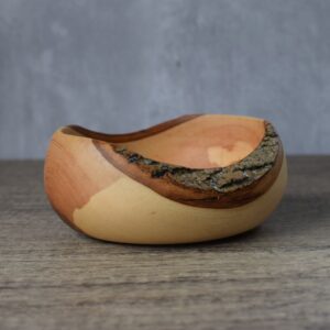 Ash wood turned decorative dish with a live edge bark feature