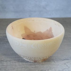 Ash wooden bowl with a textured edge